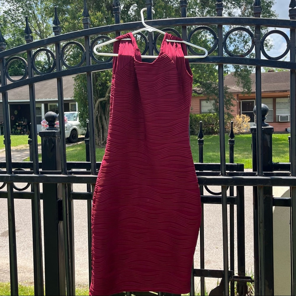 Maroon woman’s dress